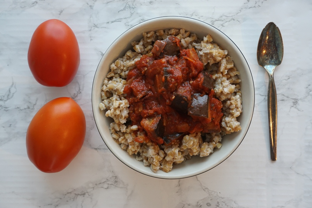 vegan Italian bowl with chickpea eggplant and farro