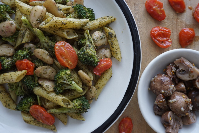 cannellini beans with broccoli pesto and pasta and cherry tomatoes