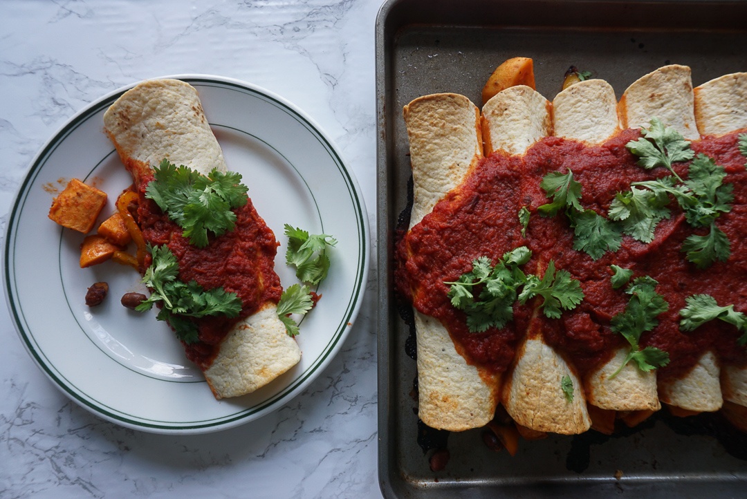 pinto bean vegan enchiladas with tomato enchilada sauce