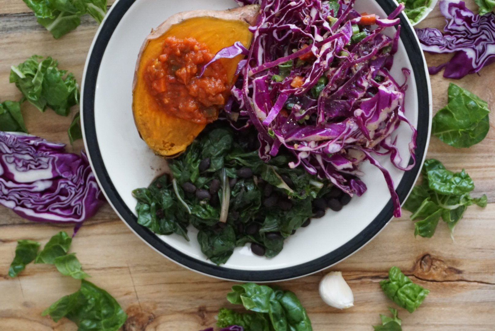 spicy black beans with collards slaw and sweet potatoes