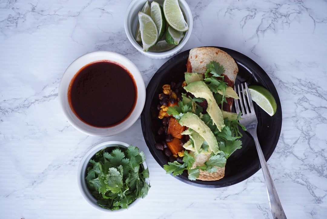 vegan enchiladas and toppings corn squash beans